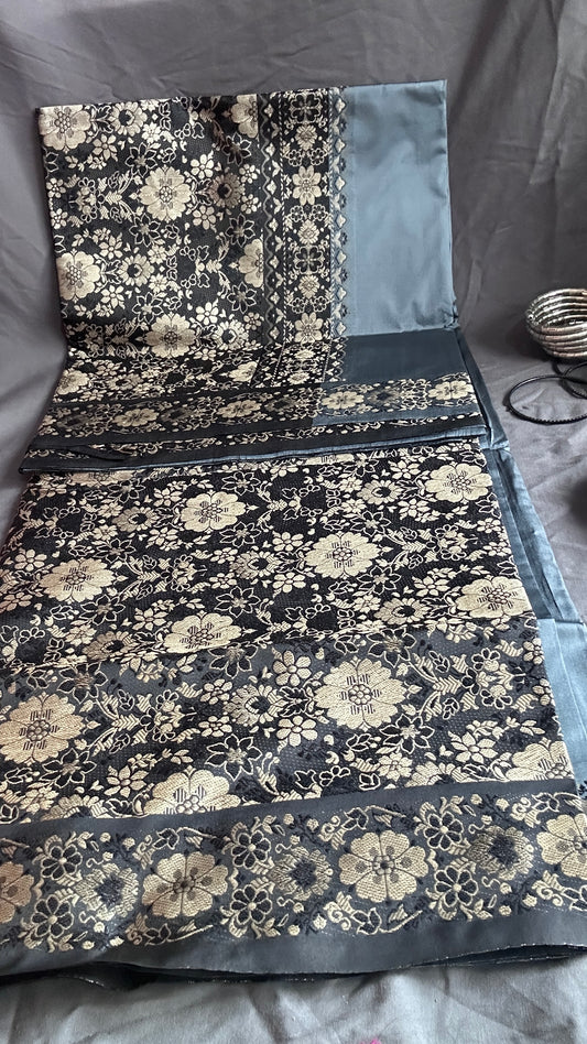 Elegant Midnight Bloom: Black and Gold Floral Saree with Blue-Grey Border